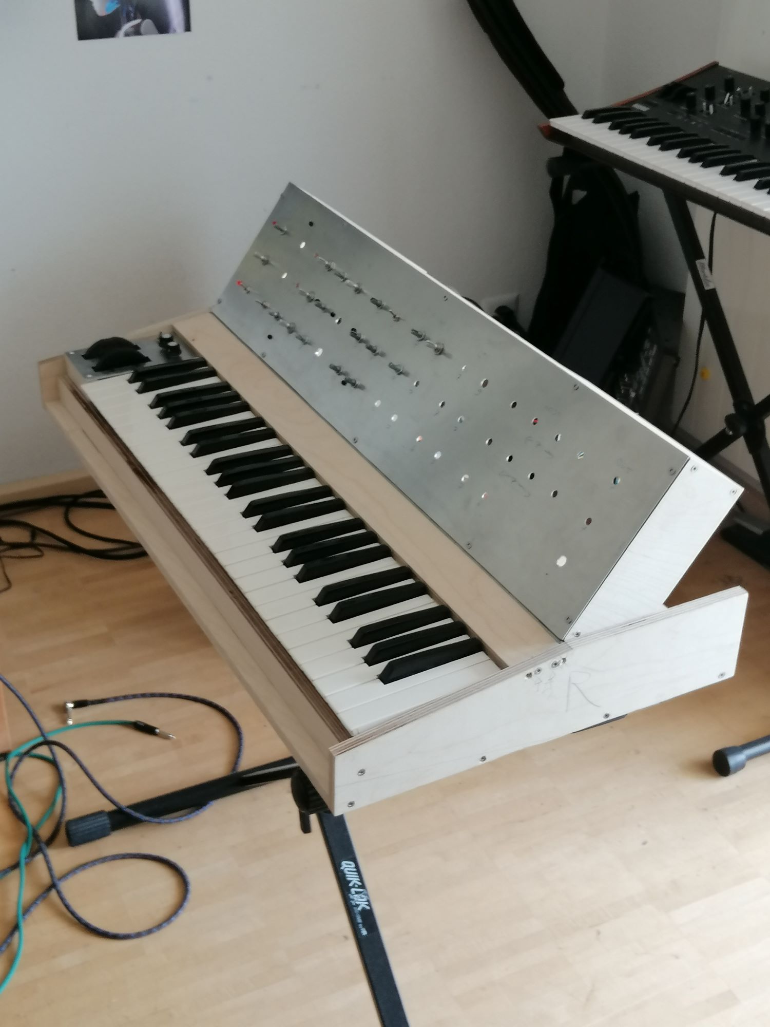 The unpainted synthesizer